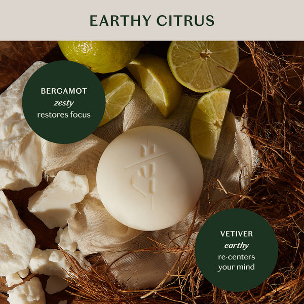 Bar of soap with bergamot and vetiver scents on a natural background