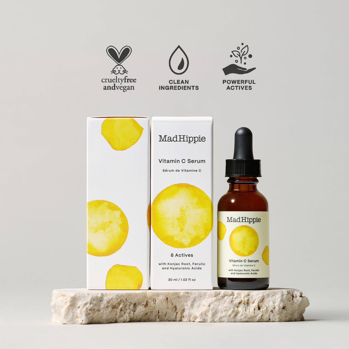 Mad Hippie Vitamin C Serum with packaging and icons indicating cruelty-free, clean ingredients, and powerful actives on a light gray background.
